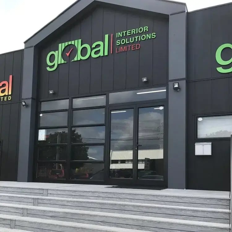 BiForm FORM 130 Camo Grey composite decking at the Global Linings commercial entrance